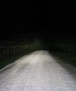 Open dirt road with awesome headlights lighting the way